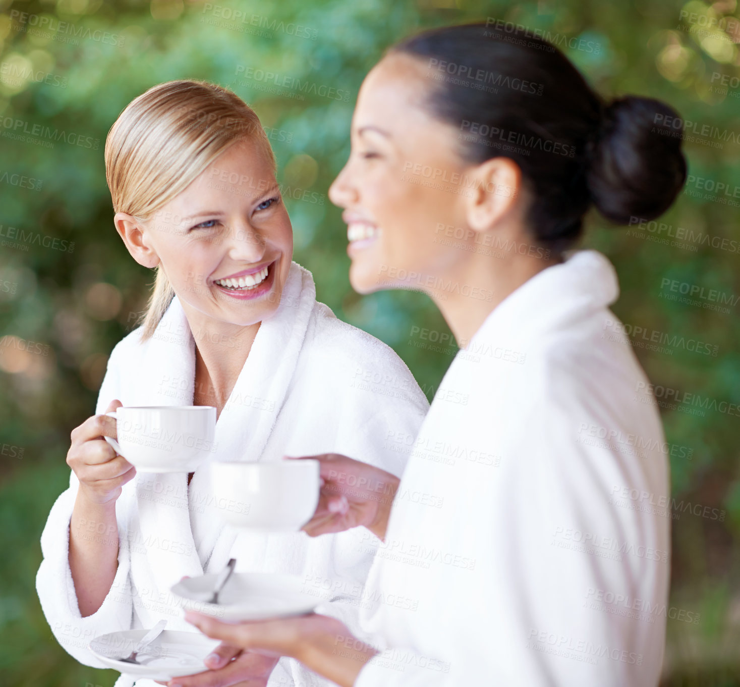 Buy stock photo Women friends at spa with tea, happy with self care and wellness, spending quality time together at luxury resort. Beauty, stress relief and female people laughing with hot beverage on a break