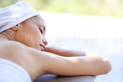 Buy stock photo Spa, woman and sleeping on massage bed with mockup for wellness, zen and beauty treatment for body care. Person, relax and physical therapy at resort, salon table and luxury on holiday or vacation