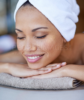 Buy stock photo Luxury, woman and relax on massage bed with smile for wellness, zen and beauty treatment for body care. Person, stress relief and peaceful at resort, salon table and spa on holiday or vacation