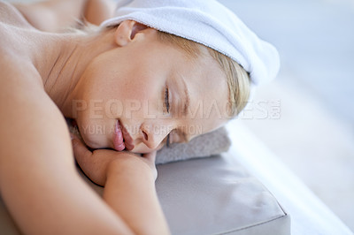 Buy stock photo Woman, relax and sleep on table in spa for skincare, beauty and luxury treatment for wellness with peace. Person, rest and lying on bed in hotel or salon for massage or dermatology care for body