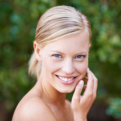 Buy stock photo Portrait of an attractive young woman touching her  face