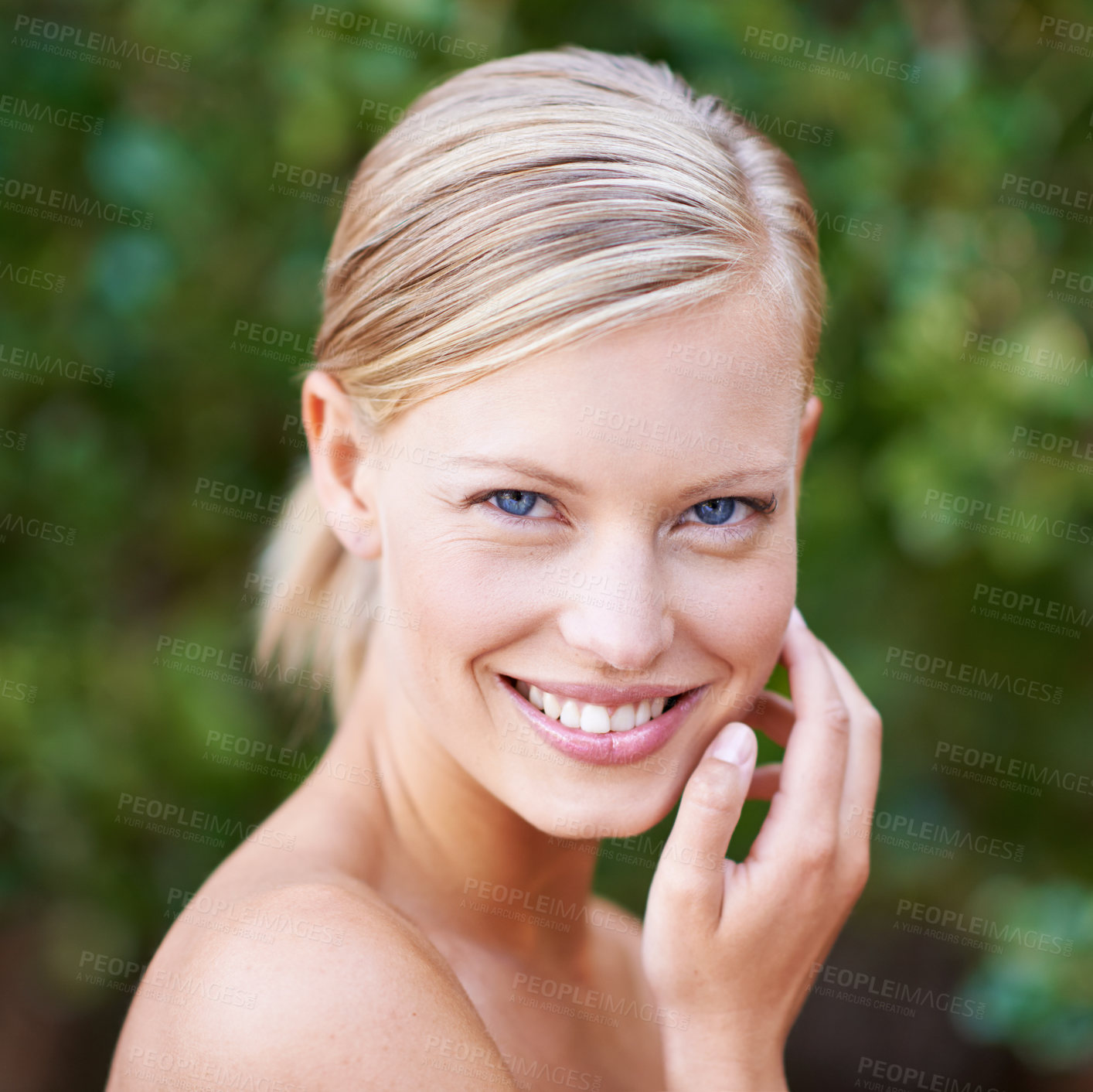 Buy stock photo Portrait of an attractive young woman touching her  face