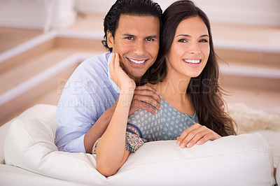 Buy stock photo Relax, hug and portrait of happy couple on couch for weekend bonding, romance and connection in home. Love, support and trust in marriage, man and woman on sofa with embrace, wellness and smile.