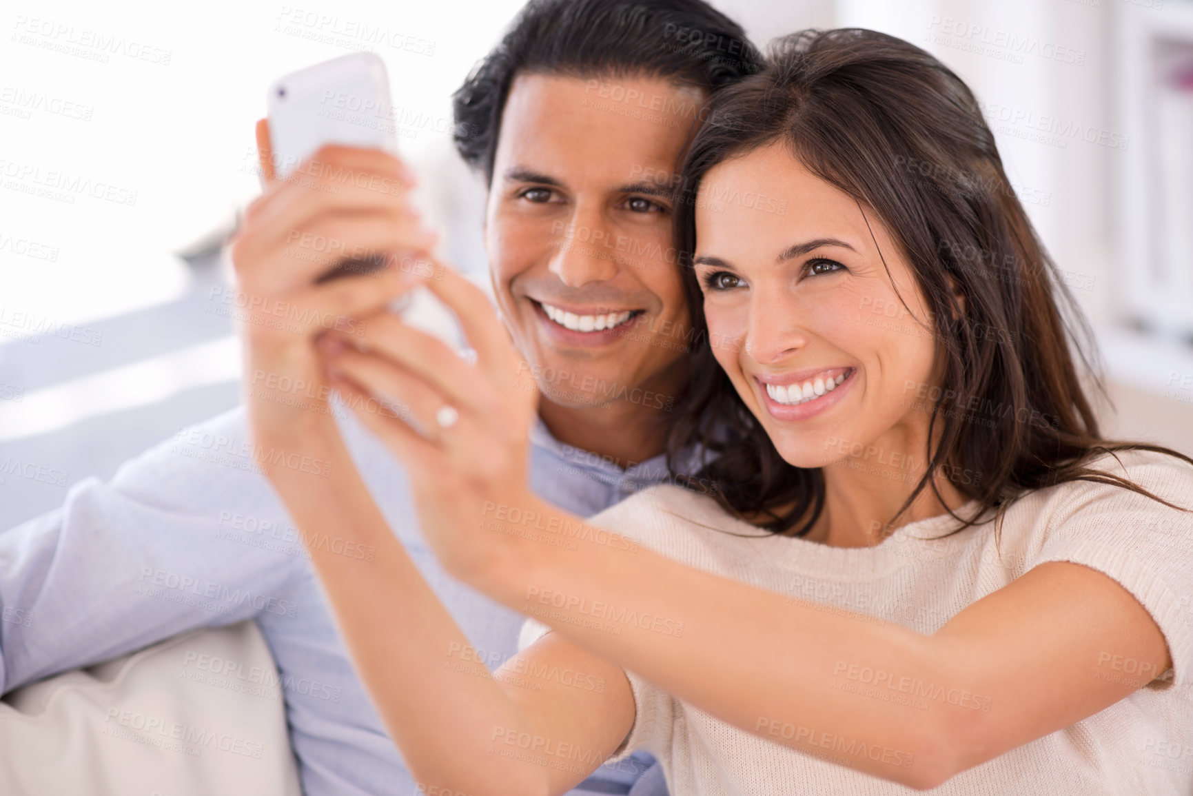 Buy stock photo Happy couple, sofa and selfie in relax for photography, picture or bonding memory together in living room at home. Young man or woman with smile for photo, vlog or social media on couch at house