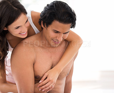 Buy stock photo Love, smile and couple hug in bedroom for care, bonding and connection together in home. Happy man, woman and people embrace for commitment, support and trust for healthy relationship on mockup space