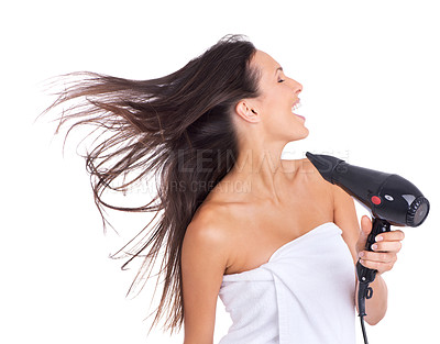 Buy stock photo Woman, hair and blow dryer in studio for beauty treatment on white background or salon product, wellness or routine. Female person, equipment and towel for morning care in London, cleaning or mockup