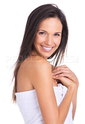 Buy stock photo A beautiful young woman standing in a towel and looking radiant