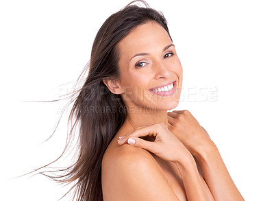 Buy stock photo Studio portrait of a beautiful young woman with silky brown hair looking happy