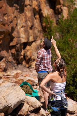 Buy stock photo Rock climbing, view and friends with route planning and pointing for adventure and outdoor exercise. Mountain, sport and training in nature with people on a peak for a workout together for fitness