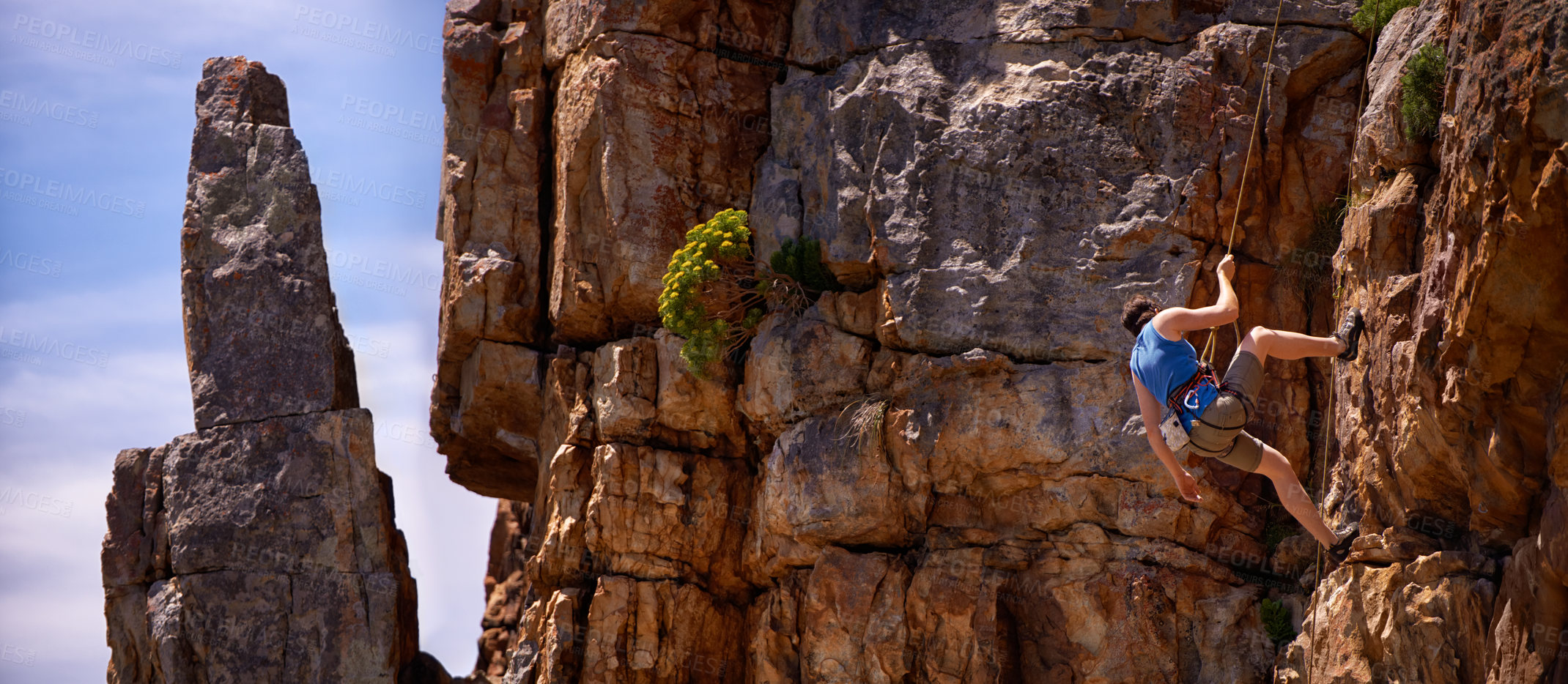 Buy stock photo Fitness, rock climbing and woman on a mountain for wellness, freedom or training outdoor. Balance, cliff or back of athlete with adrenaline, sport or energy for workout, challenge or body performance