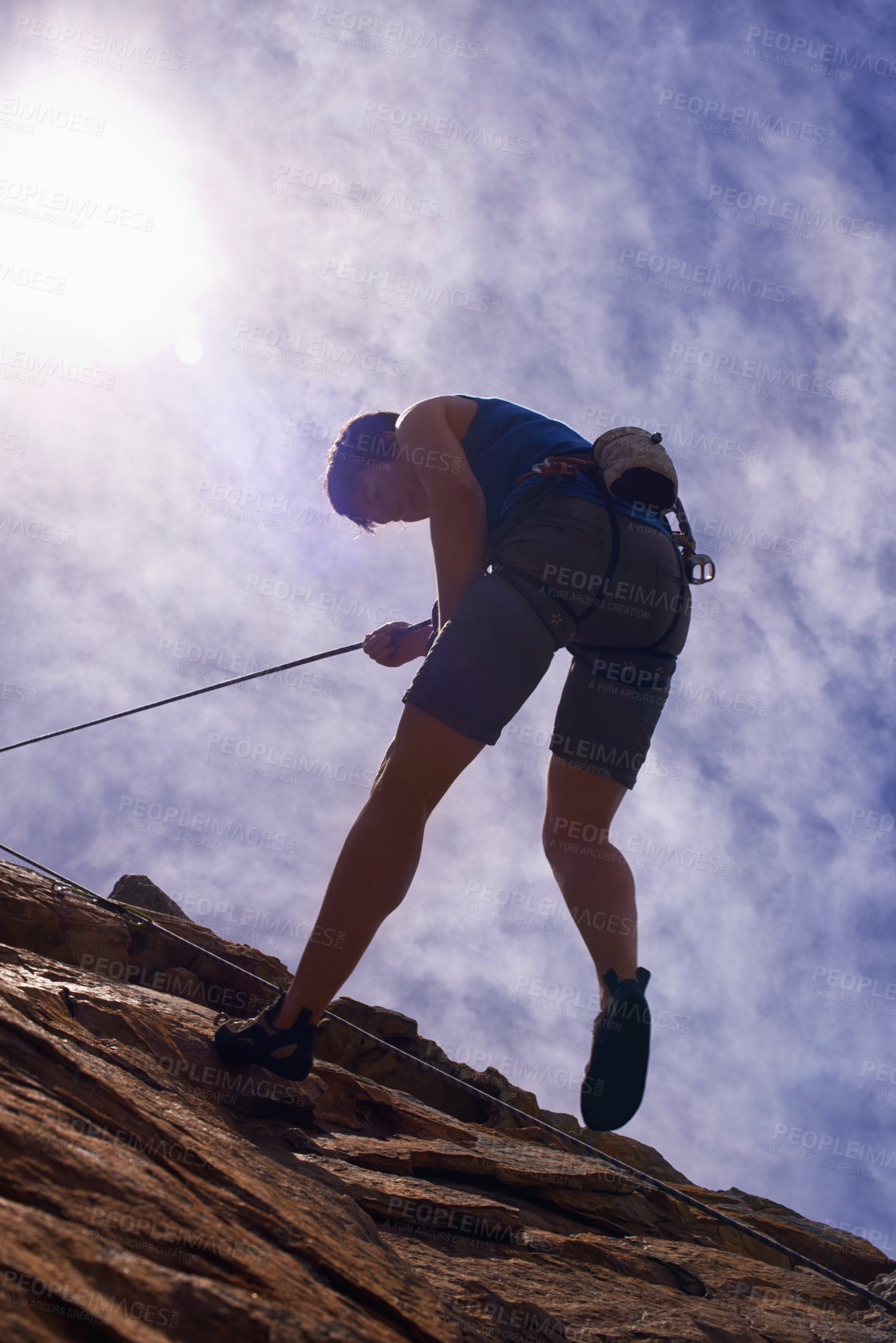 Buy stock photo Fitness, mountain and woman rock climbing in nature for wellness, freedom or training. Balance, cliff or below lady athlete with adrenaline, sport or energy for workout, challenge or body performance