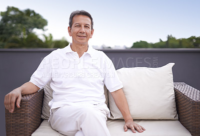 Buy stock photo Outdoor, portrait and man relax on couch of house with smile on face for comfort and sun in patio. Mature person, happy and enjoying nature, outside and home for retirement, senior and elderly