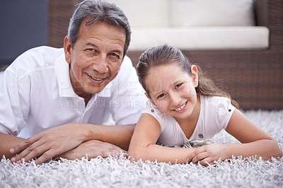 Buy stock photo Portrait of a young girl and her grandfather