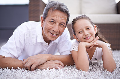 Buy stock photo Happy, portrait and grandpa with girl in home on holiday or vacation together in retirement with smile. Senior, man and grandparent relax with child on floor in living room and bonding in Mexico