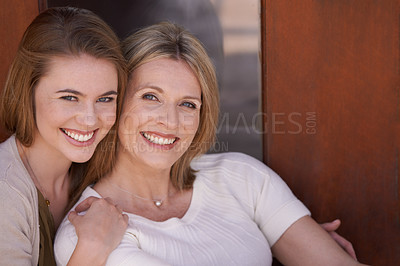 Buy stock photo Mother, daughter and hug with smile, bonding and love for happiness at home. Women, motherhood and house for growth, connection and positivity while relaxing with embrace and sunshine, joy or fun