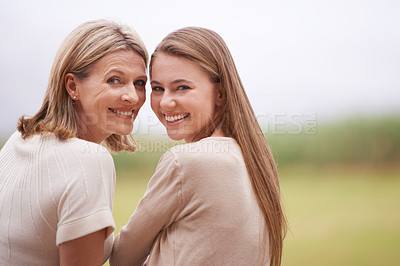 Buy stock photo Mother, daughter and portrait for outdoor, bonding and face with autumn for love and happiness. Mature female person, young woman and smile for family, nature and together with mom for vacation