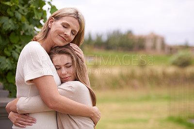 Buy stock photo Mother, daughter and hug with love outdoors in nature for mothers day, care and affection for gratitude. Mom, teenage child and bonding together on summer vacation for support, smile and family