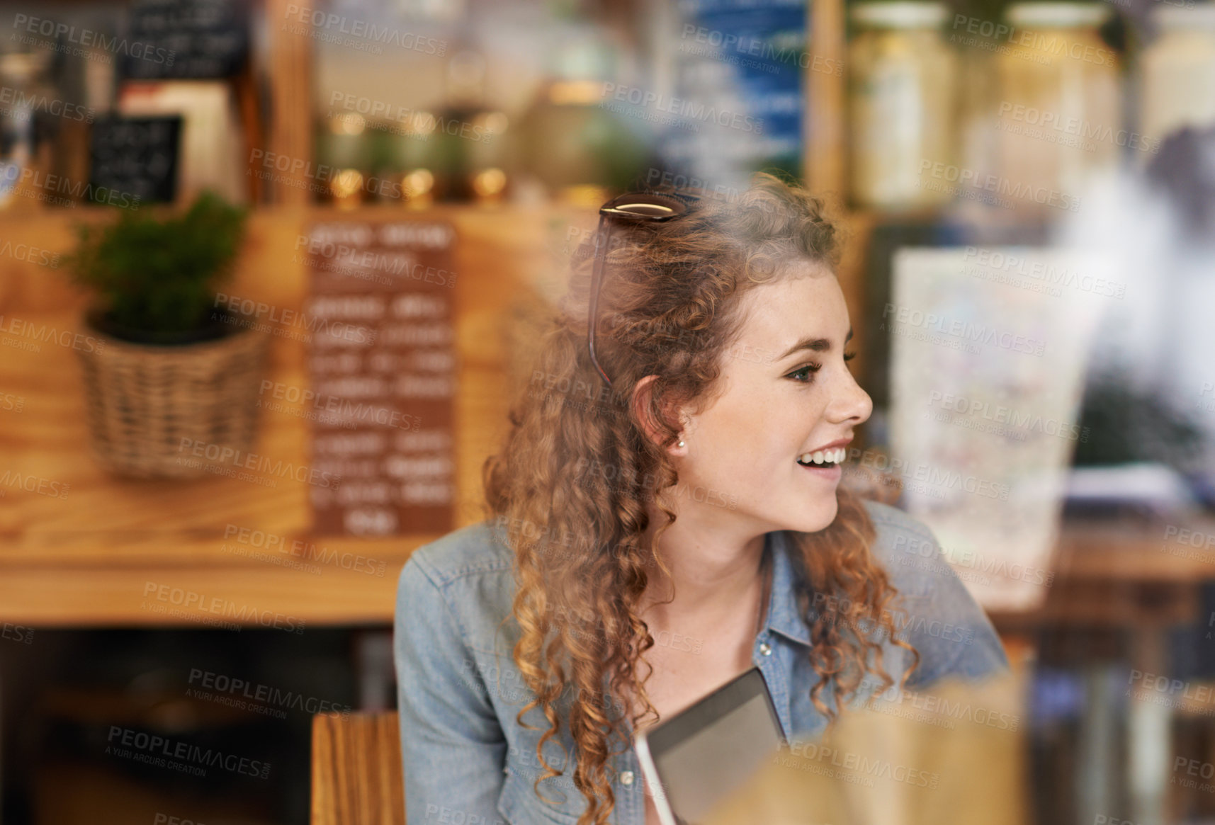 Buy stock photo Coffee shop, relax and woman in window with laptop for internet, social networking and website. Happy, smile and person on computer in restaurant, cafe and diner for caffeine, beverage and cappuccino