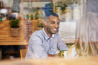 Buy stock photo Happy, friends and man in window at cafe for brunch together on holiday or vacation in Mexico. Person, smile and talk to people in coffee shop with funny conversation at lunch with espresso or latte