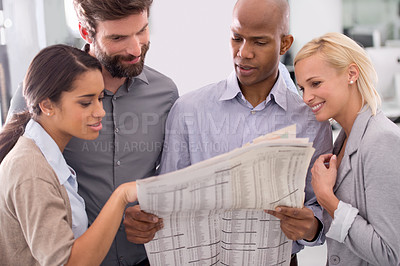 Buy stock photo Happy business people, newspaper and reading information for stocks, game or team building at office. Colleagues or employees with document or paper for finance, politics or planning at workplace