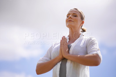 Buy stock photo Happy woman, yoga and meditation in spiritual wellness or faith with cloudy sky background. Female person or yogi meditating or hands together for praying, hope or awareness with fresh air in nature