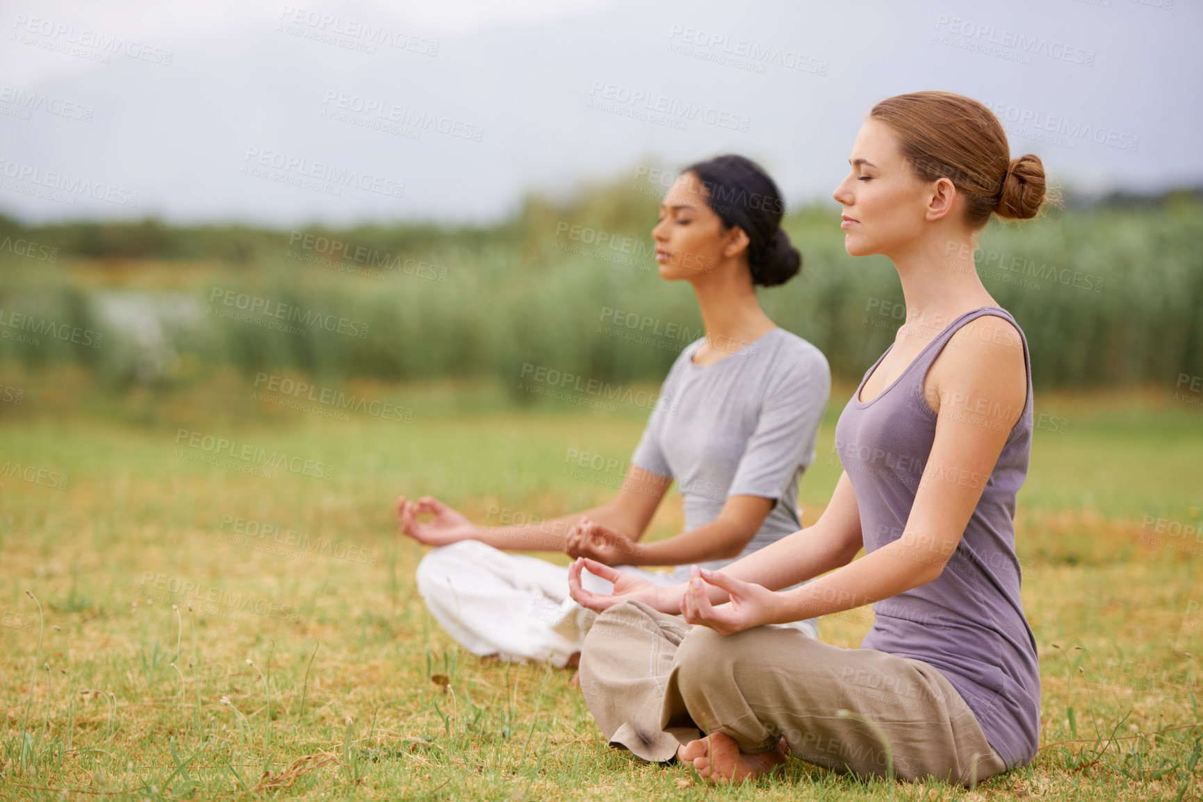 Buy stock photo Lotus, friends and meditation outdoor for yoga, healthy body and mindfulness exercise for fitness. Peace, zen and calm women in padmasana in nature for balance, spirituality and practice for wellness