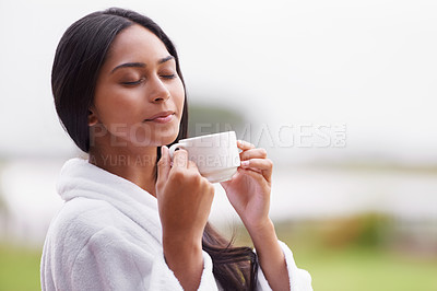 Buy stock photo Spa, beauty and woman relax with coffee for skincare, wellness and treatment in luxury salon. Resort, garden and person for massage, therapy and cosmetics for relax, calm and self care outdoors