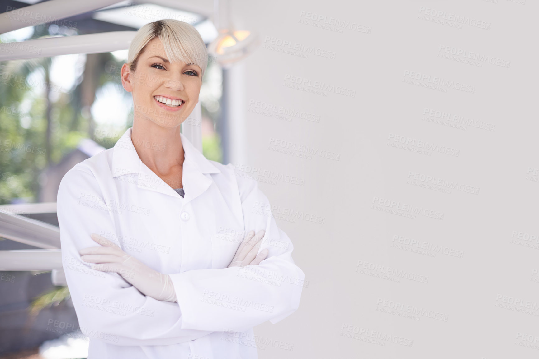 Buy stock photo Portrait, dentist and doctor woman in clinic with confidence, expert advice and orthodontics for medical health. Dental medicine, healthcare and professional with pride, arms crossed and oral service