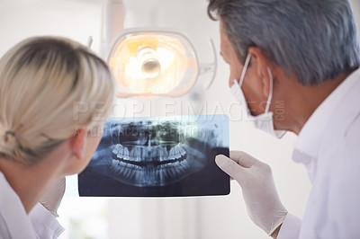 Buy stock photo Dental, care and team checking x ray with man, woman and professional opinion for consultation from back. Dentist, technician and healthcare of mouth for gums, teeth and expert advice on toothache.