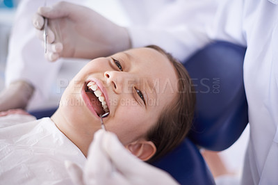 Buy stock photo Girl, child and hands with tools for dental, gum disease and oral hygiene with mouth inspection and face. Medical, orthodontics and consultation for teeth health, happiness or wellness with excavator