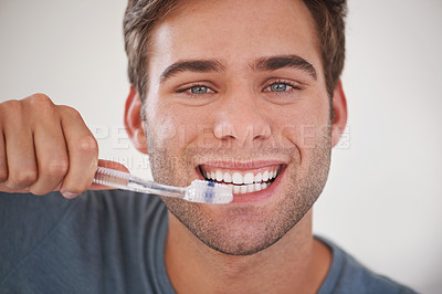 Buy stock photo Face, man brushing teeth and toothbrush for dental and wellness, fresh breathe and tooth whitening in morning routine. Clean mouth, toothpaste and oral care with orthodontics and hygiene in portrait