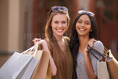 Buy stock photo Women, friends and shopping bag in city for fashion, sale and discount in a happy portrait. Face of young people with smile and diversity for cool accessories, sunglasses or clothes in outdoor luxury