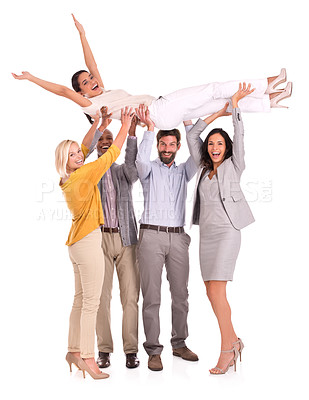 Buy stock photo Full length shot of a group of colleagues holding another coworker above their heads 