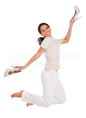 Buy stock photo Excited, jump and portrait of happy woman in studio with news, sale or shoes discount on white background. Wow, energy or female model with deal celebration, freedom or retail, shopping or mall promo