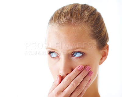 Buy stock photo Face, woman and studio in shock with embarrassed in white background and thinking with idea. Hand, amused and surprised with secret for gossip, story and amazed with thoughts and shy with news
