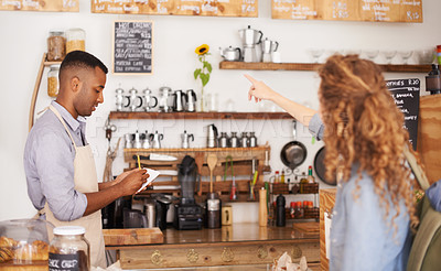 Buy stock photo Barista, cafe and customer service with drink, order and menu for choice, writing and helping. Small business owner, cashier or waiter listening to person for decision on sale and coffee shop startup