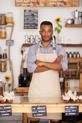 Buy stock photo Black man, portrait and waiter with arms crossed in cafe with pride for career or job. Barista, serious and confidence of African person from Nigeria in restaurant, small business and coffee shop.