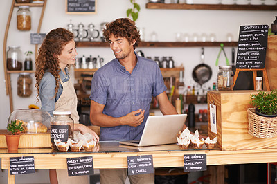 Buy stock photo Coffee shop, laptop and partnership as small business owner talking, planning and working together. Man and woman as barista, manager or waiter in restaurant with technology for service and training
