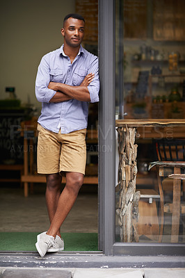 Buy stock photo Coffee shop, arms crossed and man as small business owner at door thinking of future ideas. African entrepreneur, manager or restaurant waiter with smile for service, career pride and confidence