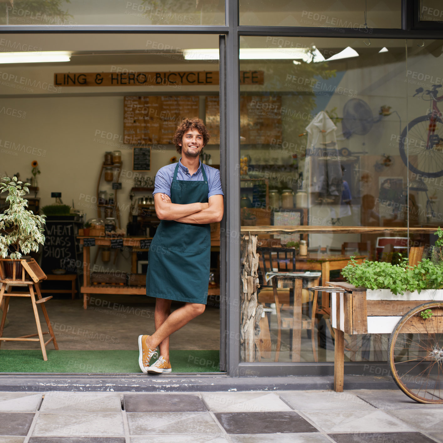 Buy stock photo Smile, coffee shop and thinking with man as small business owner at front door. Happy entrepreneur person as barista, manager or waiter in restaurant for welcome idea, career pride and startup goals