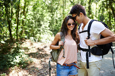 Buy stock photo Travel, love or happy couple hiking in nature or wilderness on a fun trekking adventure trip. Man, woman or romantic people in natural park or woods with care, peace or wellness on holiday vacation