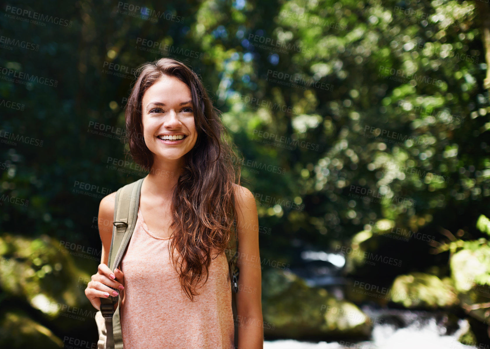 Buy stock photo Hiking, forest or happy woman with smile in nature or wilderness for a trekking adventure. Relax, bag or excited female hiker walking in a natural park or woods for exercise or wellness on holiday