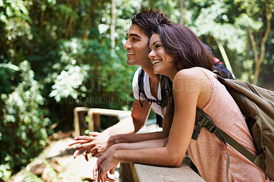 Buy stock photo Nature, hiking and couple in forest with view for adventure, smile and explore woods for wellness. Dating, travel and man and woman on trail for outdoor holiday, vacation or trekking for exercise