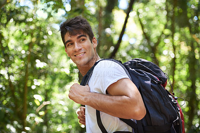 Buy stock photo Man, outdoor and backpack for hiking in rainforest with smile for adventure, holiday and thinking in summer. Person, happy and bag for trekking, walk and direction in nature for  vacation in Colombia