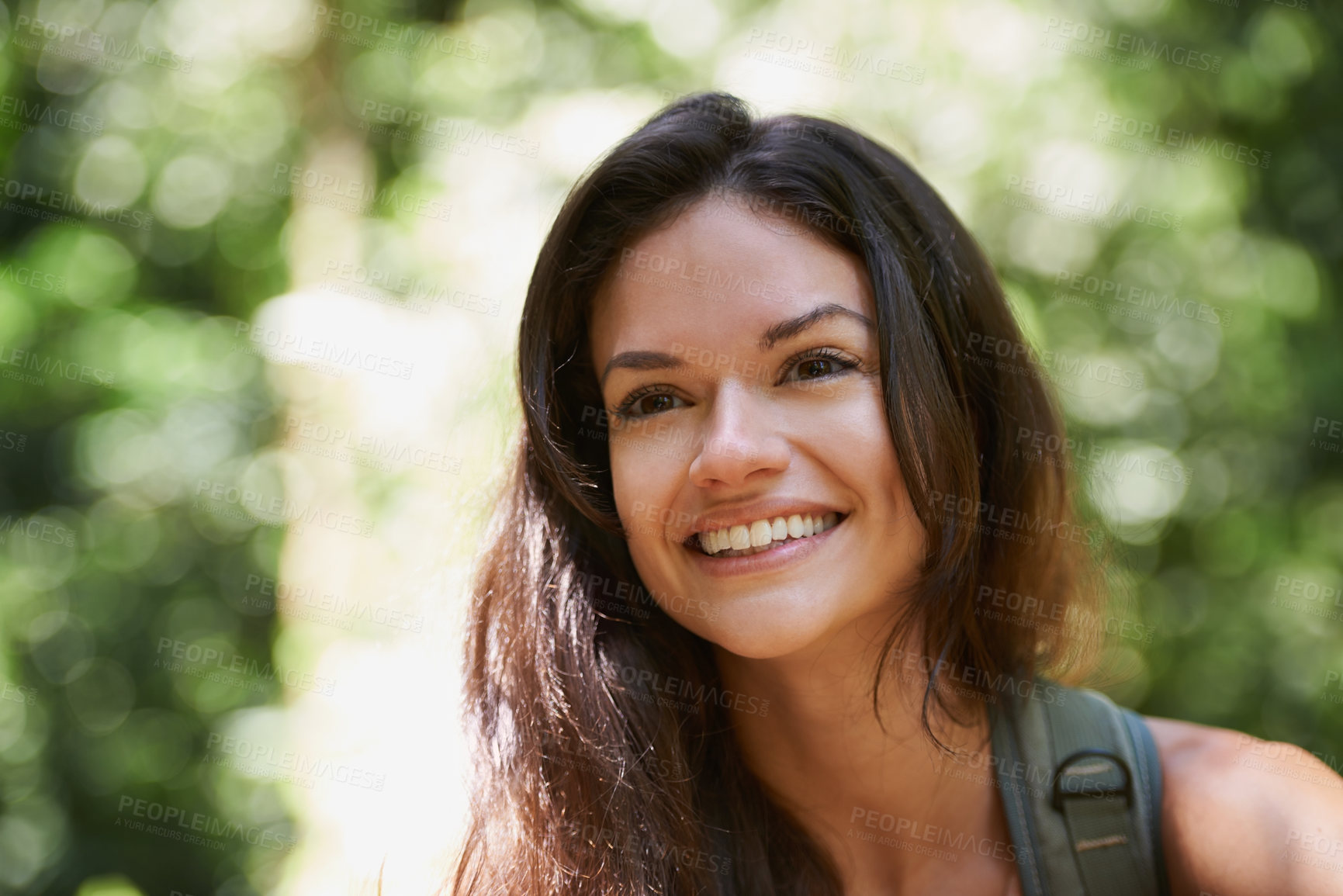 Buy stock photo Hiking, face or happy woman with smile in forest or wilderness for a trekking adventure. Woods, travel or excited female hiker walking in a natural park or nature for exercise or wellness on holiday