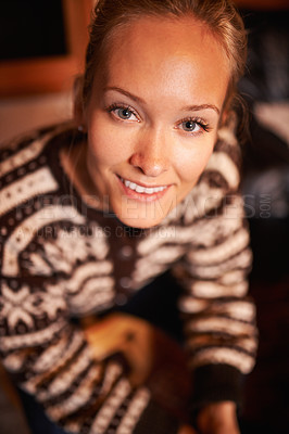 Buy stock photo Closeup, portrait and woman in house for night, enjoyment and relax on weekend with smile. Home, winter and face of female person with resting on holiday, vacation or getaway from high angle