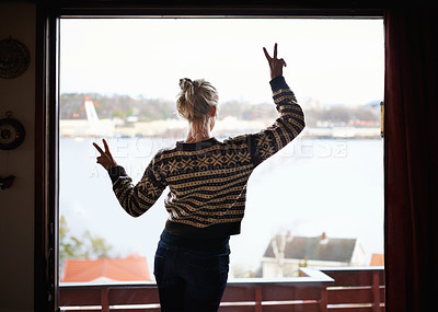 Buy stock photo Peace sign, view and woman at window with lake, emoji  and relaxed on holiday and vacation. Back, travel and female person on getaway, leisure and symbol on trip, retreat and acomodation for trip