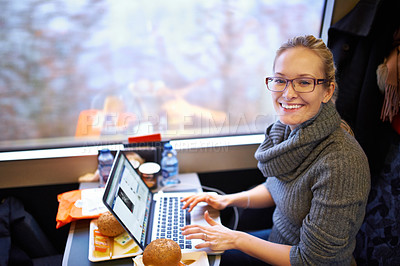 Buy stock photo Woman, train and portrait with laptop for travel journey on commute as destination blogger, communication or transportation. Female person, face and meal in coach in Canada, research or passenger