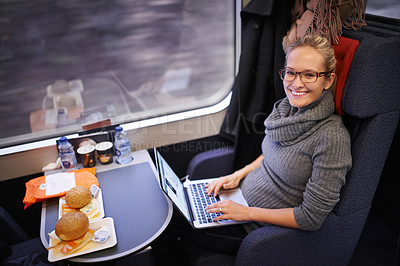 Buy stock photo Woman, train and portrait with laptop for commute journey for networking as travel blogger, communication or transportation. Female person, face and meal in coach in Canada, research or passenger