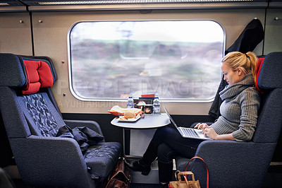 Buy stock photo Woman, train and travel with laptop on journey or research project on commute for destination, transportation or internet. Female person, railroad and passenger in Canada for comfort, tourist or trip